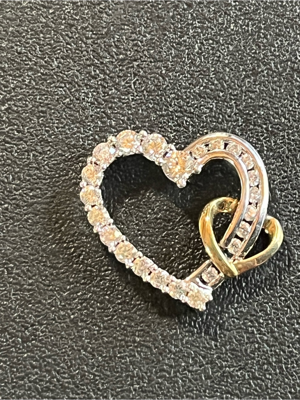 Sterling Silver and 10k heart shaped pendant with CZS.